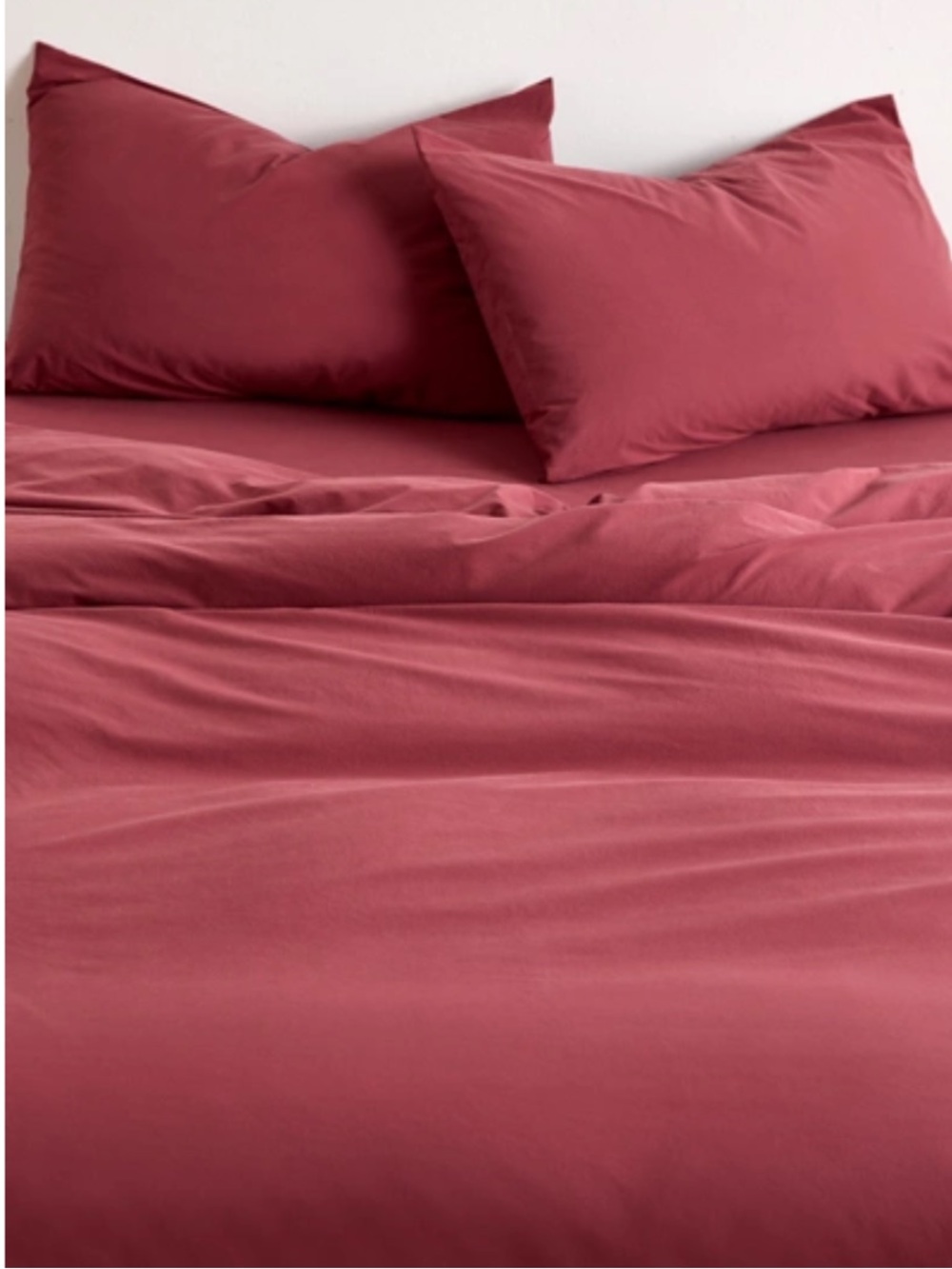UO Breezy Cotton Percale Duvet
Cover Set in Oxblood Red TWIN